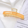 Pinza per capelli rettangolare ambra arancione con elegante base in metallo dorato - Arancione