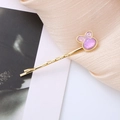 Cute golden rabbit hair clip with purple glitter design on beige fabric background - Light Purple