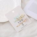 Set di fermagli per capelli a farfalla dorati con perle e cristalli su piatto bianco - Grigio Argento