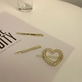 Three-piece set of golden hair clips featuring minimalist pins and heart claw clip - Heart Jewelry Set
