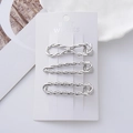 Lot de trois barrettes à cheveux en métal argenté avec motifs papillon et vague sur carte - Style Nœud Creux / Combinaison Argent