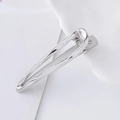 Detail view of silver metal hair clip with anti-slip grid texture on the inner surface - Silver Minimalist Long Duckbill Clip