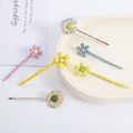Cute daisy flower hair clips set in pink, yellow, and blue colors for girls - 6-Piece Set