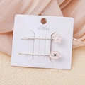 Detalle de pinzas para el pelo con estrella rosa y nube en tarjeta de regalo blanca - Estrella Nube Rosa