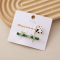 Set di fermagli per capelli con panda e foglie di bambù dorate su carta bianca - Stile Panda E Bambù / Verde Smeraldo