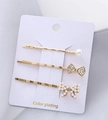Set di 3 fermagli dorati per capelli con perle e decorazioni a farfalla di cristallo - Set Di Tre Pezzi Con 12 Archi Combinati