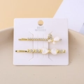 Exquisite gold alloy hair clips set with cat-eye stone flowers and heart-shaped butterfly - Butterfly Bow Set