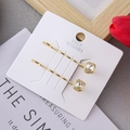 Detail of two gold-plated hair pins with square crystals on a white card - Quadrilateral / 2 Pcs/Set / Gold