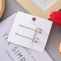 Close-up of silver alloy hair clips with square crystal stones on a white card display - Quadrilateral / 2 Pcs/Set / Silver