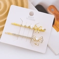 Elegant gold butterfly hair clip set with white faux pearls and rhinestones on card - 2PCS / Display Set 4 (4 PCS)