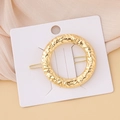 Minimalist gold round geometric hair clip with hammered texture and metal finish - Hammered Circle