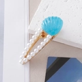 Close-up of ocean style hair clip with blue resin shell and white pearls on gold base - Blue Pearl Shell Style C