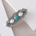 Dettaglio del fermaglio vintage in lega d'argento con turchese e perle bianche - Argento Antico Traforato Turchese Perla