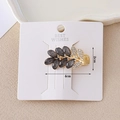 Leaf-shaped golden hair clip with dark grey gemstones and sparkling rhinestones - Obsidian-Look Hair Clip