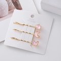 Dreiteiliges Set aus goldenen Haarspangen mit Stern Mond und Schmetterling Motiv - Rosa Schmetterling Stern Mond