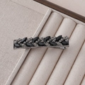 Detailed view of vintage black duckbill clip with marquise rhinestones and crystals - Black Marquise Gem Rectangular Style
