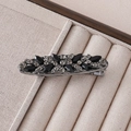Close-up of vintage black rhinestone and pearl hair clip on beige velvet display - Black Marquise Stone Vintage Long Style