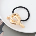 Minimalistischer Haargummi im Punk-Stil mit poliertem Metallknoten in Goldoptik - Geknoteter Stil Gold