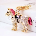 Llavero de caballo de cristal brillante con aleación dorada y detalles en esmalte rosa - Caballo de Corazón Hueco Dorado