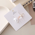 Elegante pinza francesa de perla de corazón con concha brillante y detalles de cristal - Perla de Corazón Blanco