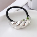 Black elastic hair tie featuring a silver spiral metal charm with a polished finish - Silver Twist Croissant