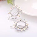Silver hollow circular hair clip with rainbow rhinestones and secure snap closure - Circle 1 Silver