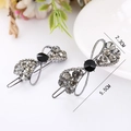 Elegant bowtie crown hair clips with grey and black rhinestones on gunmetal base - Bowknot 1 Gun Black