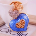 Blue marble enamel hollow heart keychain with sparkling crystal charms and gold finish - Blue