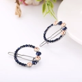 Navy blue and champagne crystal hair clips on a gunmetal round alloy frame - Circle 2 Gun Black