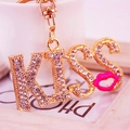 Sparkling rhinestone KISS letter keychain with pink lips pendant in gold finish - Rose Red