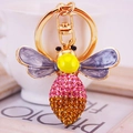 Pink and orange crystal bee keychain with gold finish and marbled wings detail - Gray