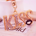 Golden KISS letter keychain with sparkling crystals and black enamel lip charm - Black