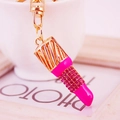 Porte-clés rouge à lèvres rose pailleté avec fermoir en métal doré pour femme - Fuchsia