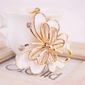 Elegant gold butterfly keychain with white enamel inlay and sparkling rhinestones - White