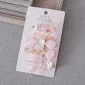 5-piece sea theme hair clip set with cream shells and starfish on display card - Pink Ocean Element Set