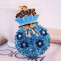Porte-clés sac à monnaie en strass bleus avec cristaux et finition en métal doré - Bleu