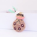 Porte-clés sac à monnaie en strass champagne avec fleurs rouges et émail rose tendre - Pêche