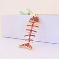 Porte-clés arête de poisson doré avec strass violets pour accessoires de sacs à main - Forme d'Arête de Poisson / Violet