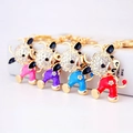 Portachiavi bue dello zodiaco colorati con strass e smalto in quattro colori diversi - Multicolore