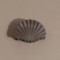 Detail of matte brown coffee shell hair claw clip on light background - Shell / Brown