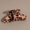 Detail view of acetate tortoise shell hair claw clip with gold Barrette La France text - Khaki Leopard
