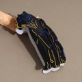 Detailansicht der schwarzen Leoparden-Haarklammer mit blauen Glitzer-Punkten - Schwarz Blauer Leopard