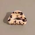 Close-up of tortoiseshell acetate hair claw clip with gold FRANCE Handmade inscription - Beige Leopard