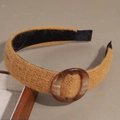 Detail of ginger yellow knitted headband with vintage marble texture oval ring buckle - Yellow