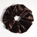 Detailed close-up of coffee brown velvet scrunchie showing soft texture and pleated design - Brown