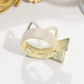 Close-up of cat-ear shaped gold metal hair claw clip encrusted with white pearls - Cat Ears Gold
