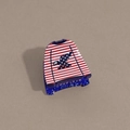 Detail view of mini USA sweater hair claw clip with blue glitter base and eagle design - Clothes Style Blue Base