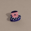 Close-up of sparkling blue glitter hair claw clip with American flag top hat design - Hat Style Blue Base