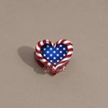 Macro detail of the heart-shaped hair claw clip with American flag stars and stripes pattern - Heart Star Red Base