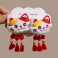 Pair of plush Maneki Neko hair clips with red tassels and soft festive faux fur - Pair of Lucky Cat Tassel Hair Clips